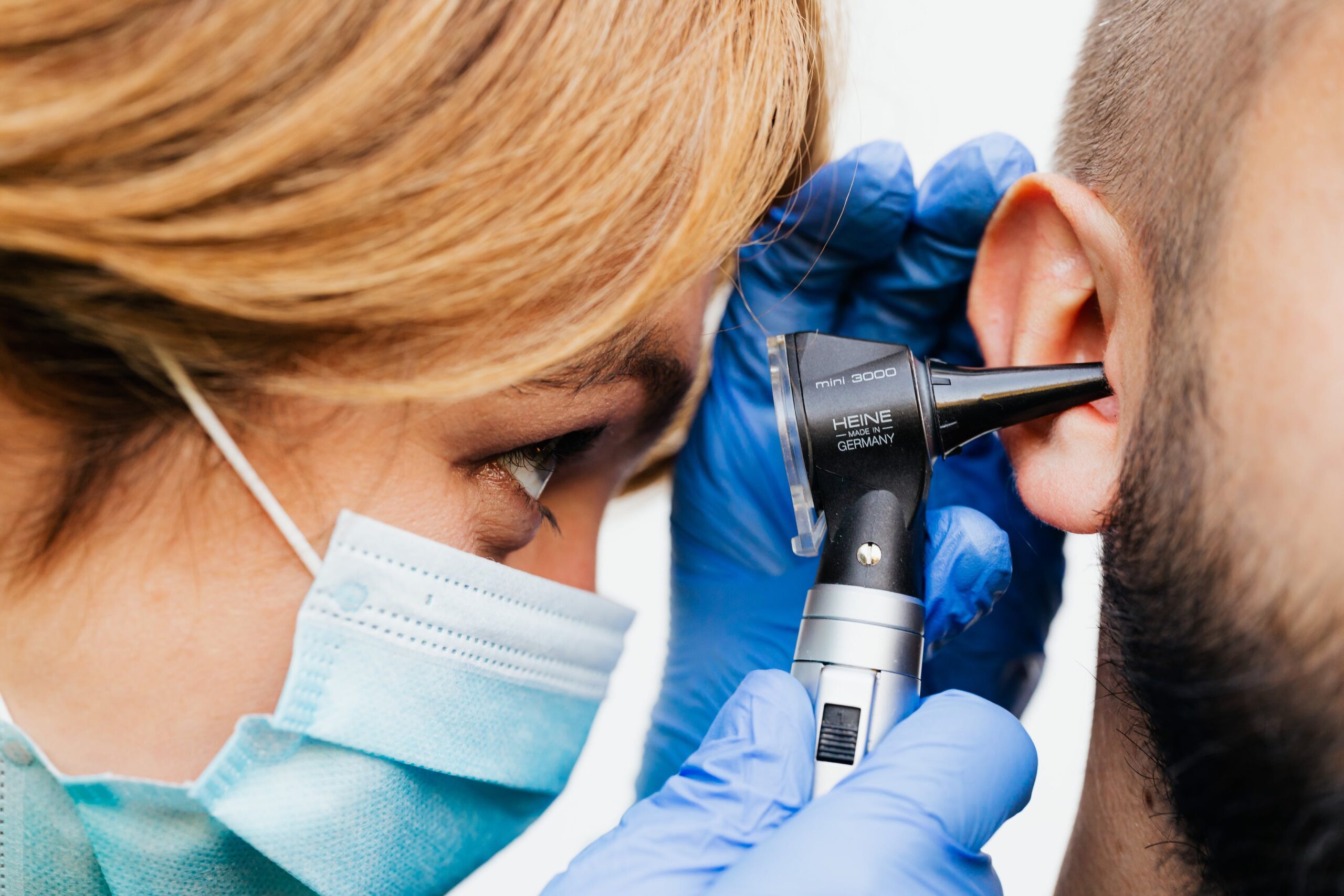 Doctor doing an ear exam